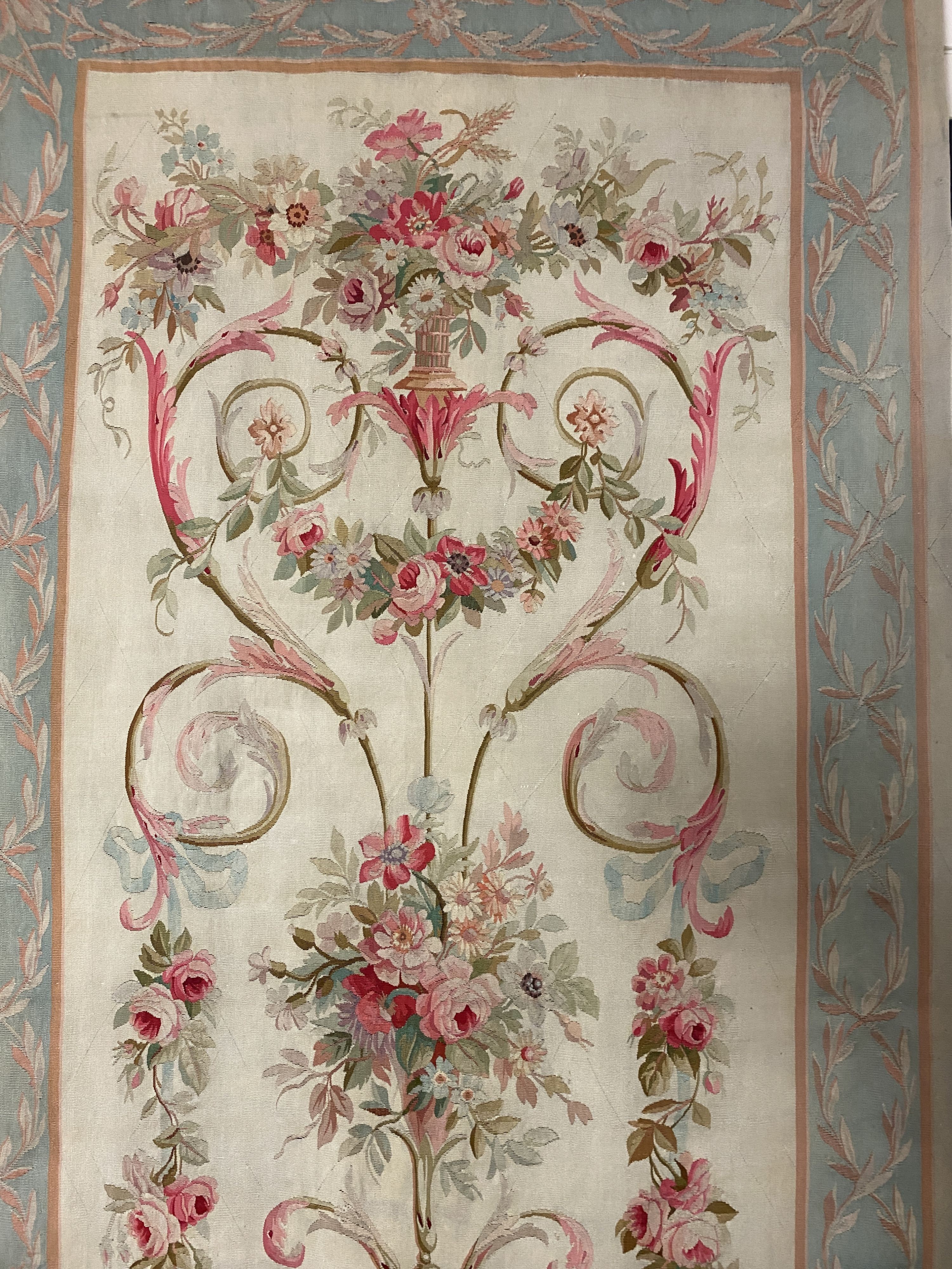 A large 19th century Aubusson entre fenetre tapestry wall panel, 297 cm X 136 cm